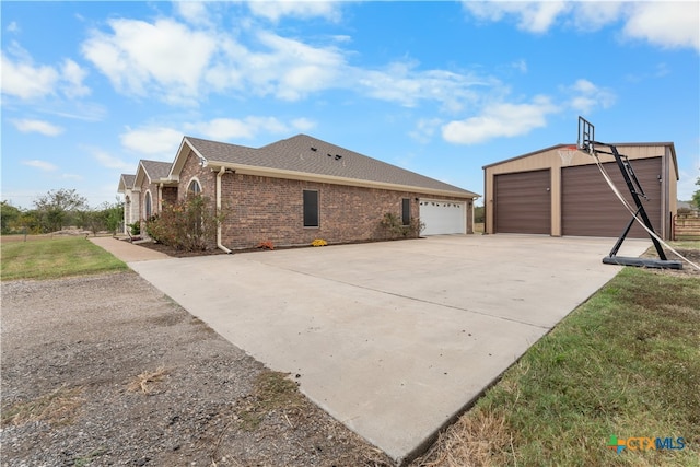 view of side of property with a yard