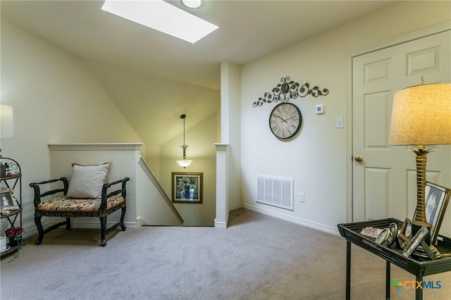 1320 Daisy Ln, Temple, TX 76502 - living area with an upstairs landing, carpet floors, a skylight, and lofted ceiling