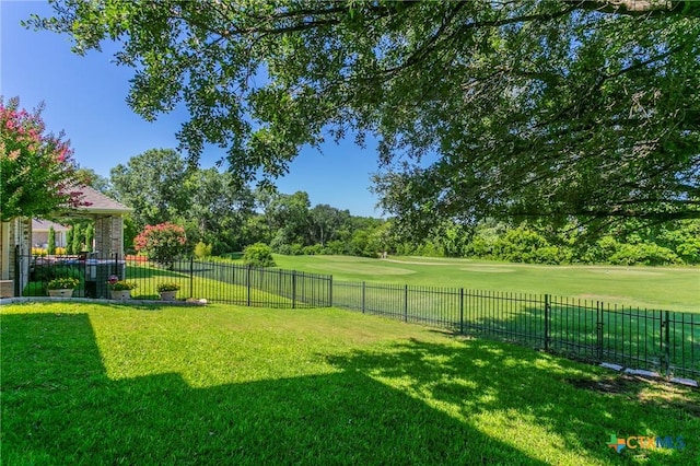 1320 Daisy Ln, Temple, TX 76502 - fenced backyard with view of golf course