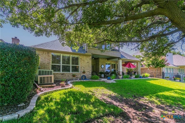 1320 Daisy Ln, Temple, TX 76502 - rear view of property featuring brick siding