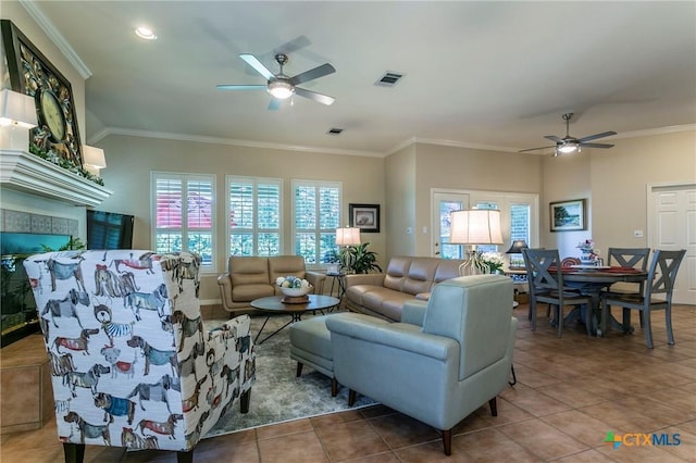 1320 Daisy Ln, Temple, TX 76502 - tiled living room with ceiling fan, ornamental molding, and recessed lighting