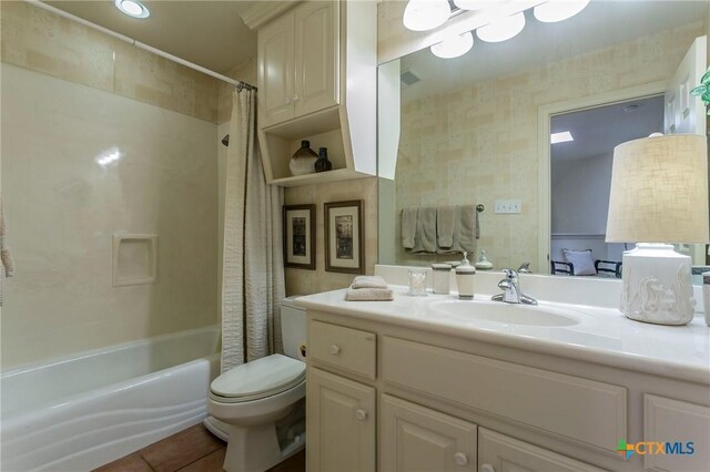 1320 Daisy Ln, Temple, TX 76502 - bathroom featuring vanity, shower / tub combo, and tile patterned floors