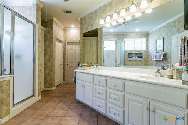 1320 Daisy Ln, Temple, TX 76502 - full bath with ornamental molding, a ceiling fan, a shower stall, double vanity, and tile patterned flooring