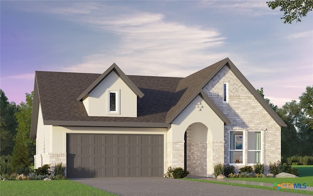 1528 Dancing Oak Ln, San Marcos, TX 78666 - view of front facade featuring a shingled roof, driveway, stucco siding, and stone siding