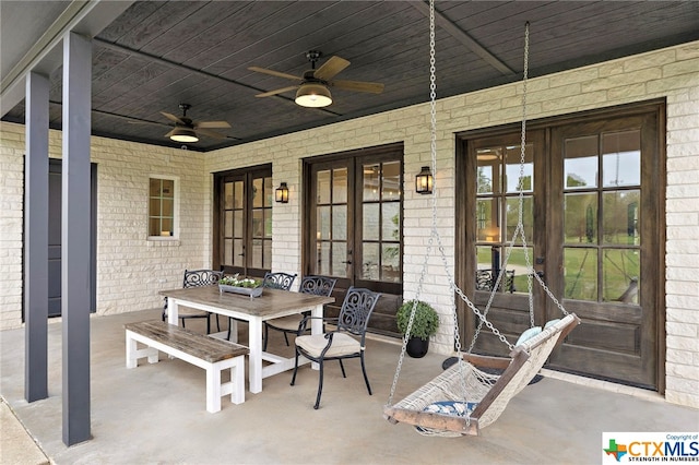 view of patio with ceiling fan