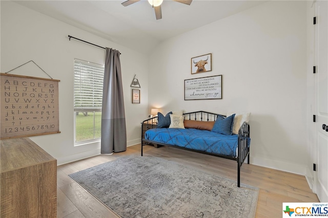 bedroom featuring ceiling fan and light wood-type flooring