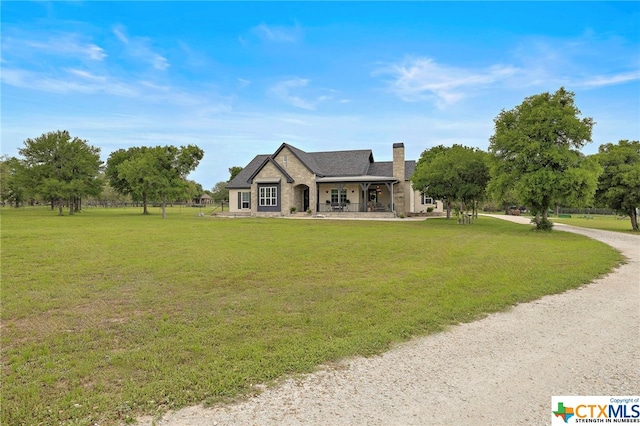 view of front facade with a front lawn