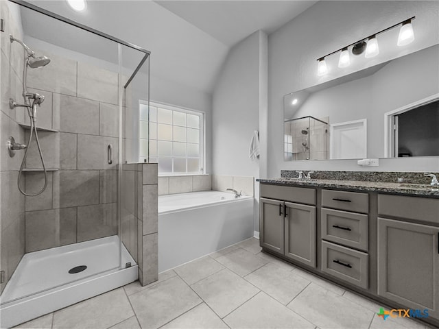 1525 Dryden Ave, Copperas Cove, TX 76522 - bathroom featuring a stall shower, double vanity, a garden tub, and tile patterned floors
