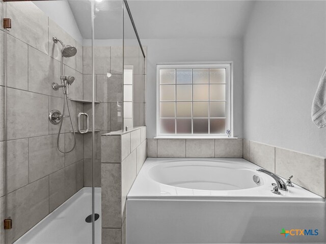 1525 Dryden Ave, Copperas Cove, TX 76522 - bathroom with plenty of natural light, a shower stall, and a bath