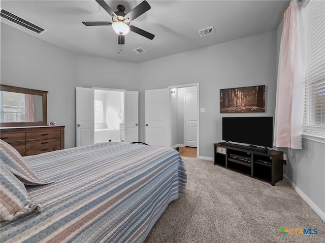 1525 Dryden Ave, Copperas Cove, TX 76522 - bedroom with carpet flooring, baseboards, ceiling fan, and ensuite bathroom