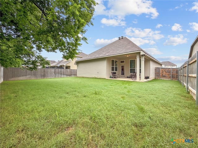 1525 Dryden Ave, Copperas Cove, TX 76522 - back of house with a patio area and roof with shingles