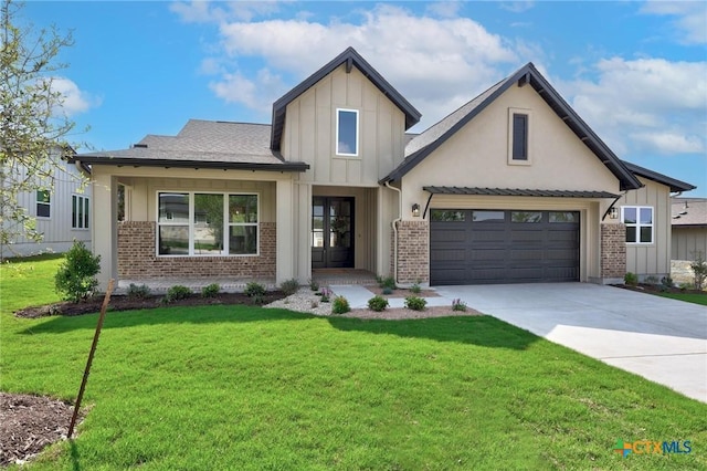 2127 Quiet Stables Cir, Cedar Park, TX 78613 - view of front of property with brick siding, board and batten siding, driveway, and a front yard