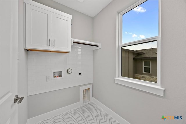 2127 Quiet Stables Cir, Cedar Park, TX 78613 - washroom with electric dryer hookup, cabinet space, washer hookup, and baseboards