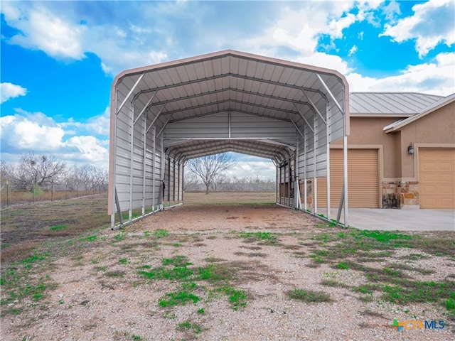 view of car parking featuring a carport