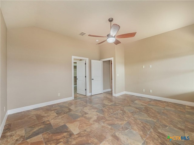 unfurnished bedroom featuring ceiling fan and lofted ceiling