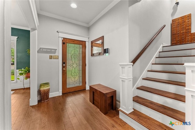 2717 Canyon Oaks Ct, Temple, TX 76502 - entryway with hardwood / wood-style flooring, ornamental molding, stairway, and recessed lighting