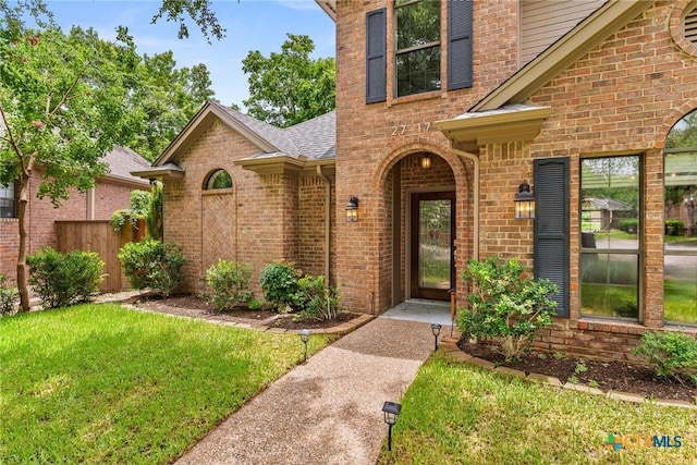 2717 Canyon Oaks Ct, Temple, TX 76502 - entrance to property featuring brick siding and a shingled roof
