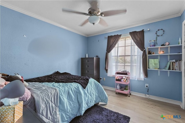 120 Mighty Oak Ln, Killeen, TX 76542 - bedroom featuring wood finished floors, crown molding, baseboards, and ceiling fan