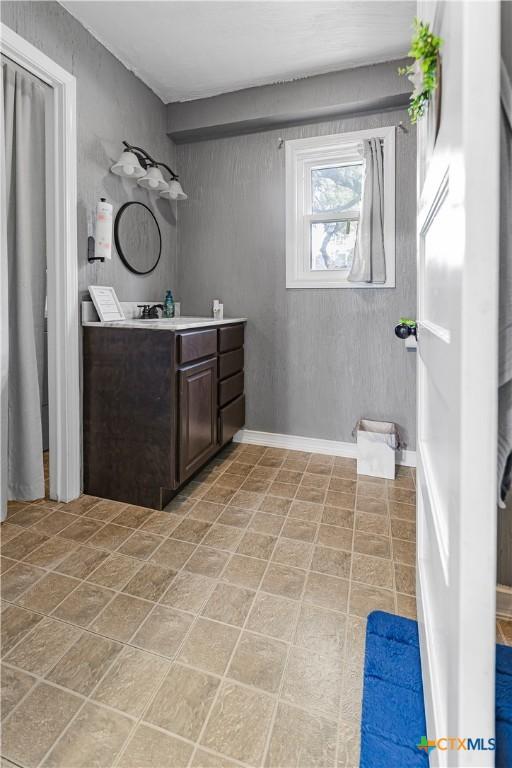 212 Whitfield St, Yoakum, TX 77995 - bathroom featuring vanity