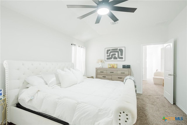 carpeted bedroom with lofted ceiling and ceiling fan