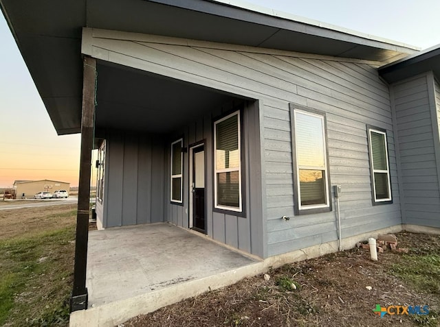 view of property exterior at dusk