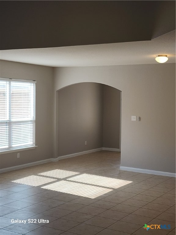 view of tiled spare room