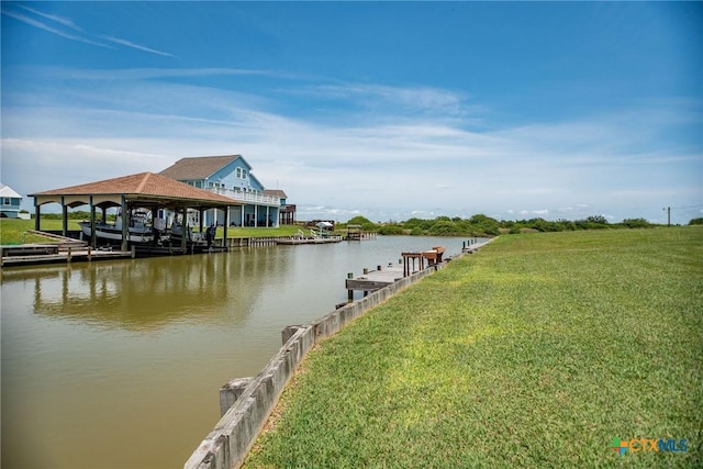40 Sailfish Lndg, Port Lavaca, TX 77979 - dock featuring a water view and a lawn