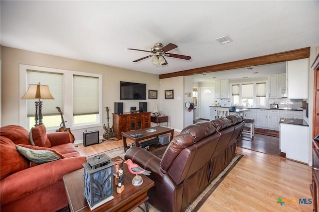 40 Sailfish Lndg, Port Lavaca, TX 77979 - living area with light wood finished floors and ceiling fan