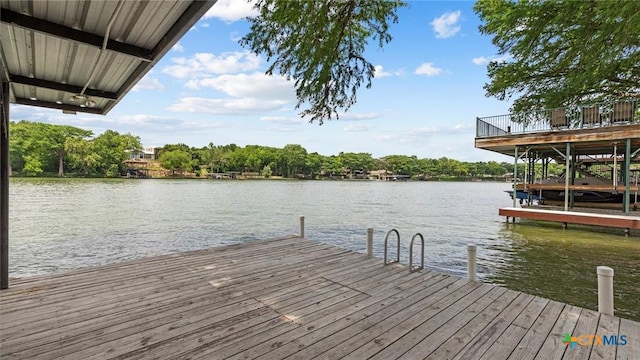 dock area featuring a water view