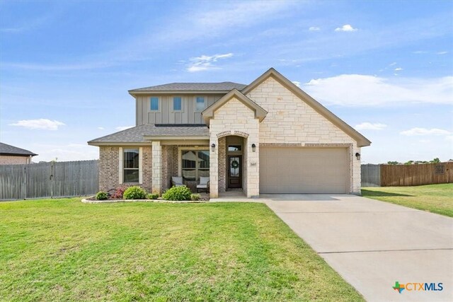5410 Tabbs Ct, Belton, TX 76513 - view of front of house with an attached garage, board and batten siding, concrete driveway, brick siding, and a shingled roof
