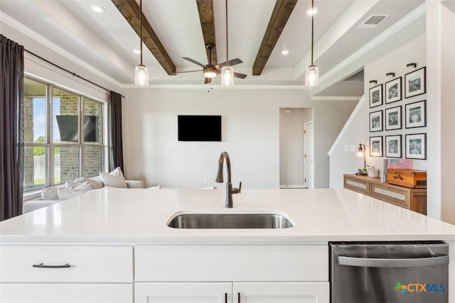5410 Tabbs Ct, Belton, TX 76513 - kitchen featuring stainless steel dishwasher, open floor plan, a sink, light countertops, and beamed ceiling