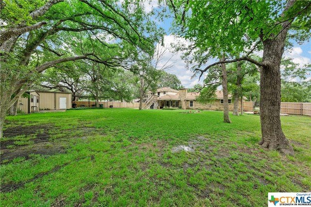 view of yard featuring fence