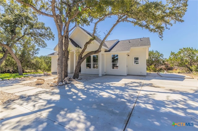 rear view of property with a patio area