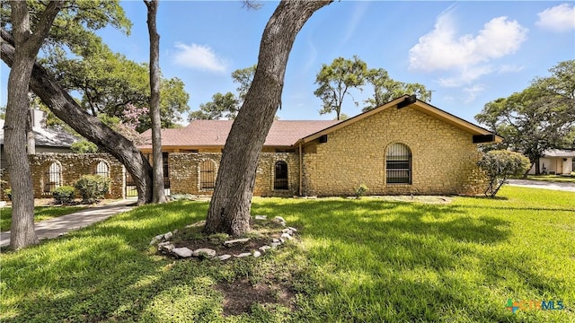 162 Lone Oak St, Seguin, TX 78155 - single story home featuring stone siding and a front yard