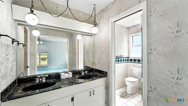 162 Lone Oak St, Seguin, TX 78155 - full bathroom with double vanity, healthy amount of natural light, and tile patterned floors