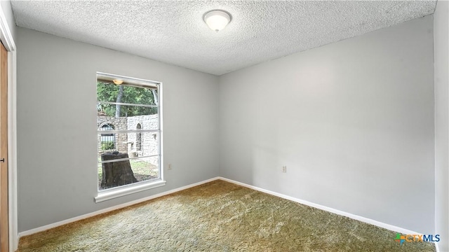 162 Lone Oak St, Seguin, TX 78155 - carpeted spare room featuring a textured ceiling and baseboards