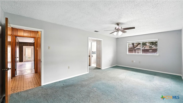 162 Lone Oak St, Seguin, TX 78155 - unfurnished bedroom with carpet, a textured ceiling, and a ceiling fan