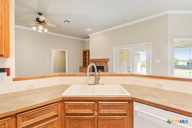 6809 Oak Vw, Belton, TX 76513 - kitchen featuring dishwasher, a fireplace, a ceiling fan, light countertops, and ornamental molding