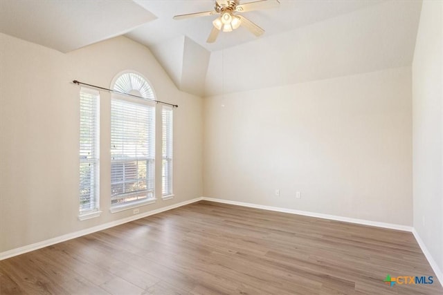 6809 Oak Vw, Belton, TX 76513 - unfurnished room with healthy amount of natural light, vaulted ceiling, wood finished floors, and ceiling fan