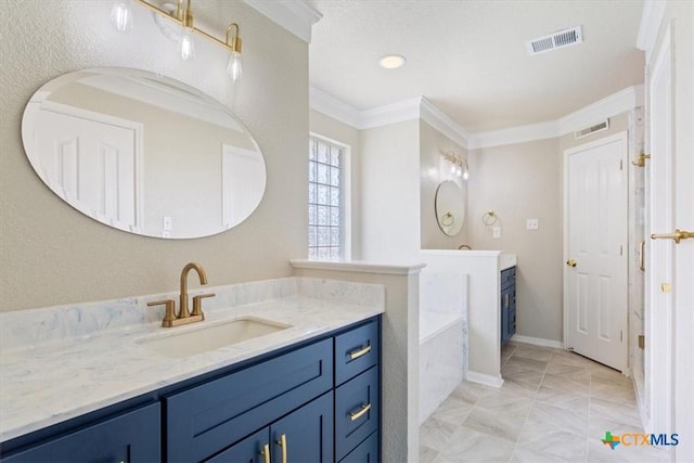 6809 Oak Vw, Belton, TX 76513 - full bathroom featuring vanity, a garden tub, crown molding, and marble finish floors
