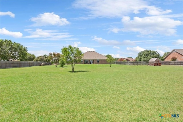 6809 Oak Vw, Belton, TX 76513 - fenced backyard featuring an outbuilding