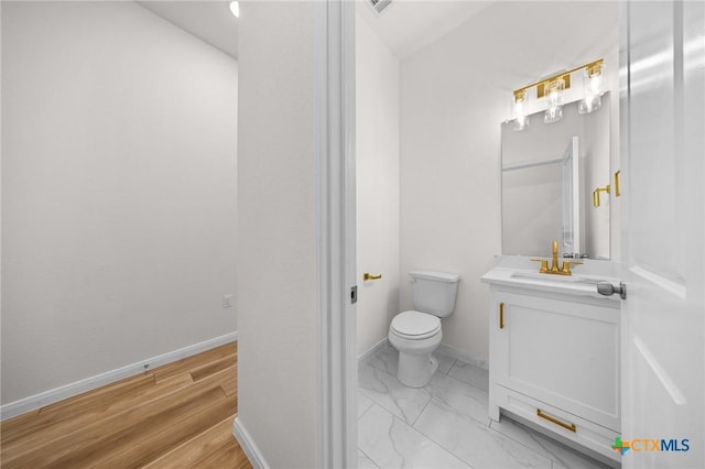 5273 Comanche Dr, Temple, TX 76502 - half bathroom with vanity and marble look tile flooring