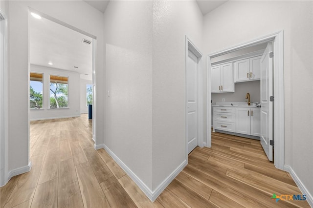 5273 Comanche Dr, Temple, TX 76502 - corridor with light wood finished floors