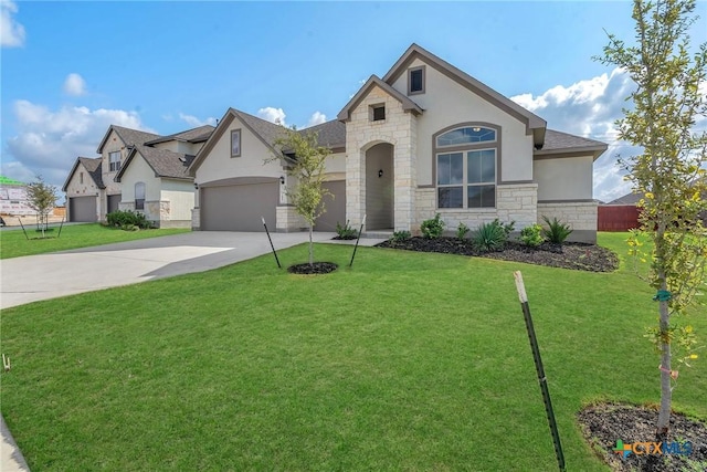 french country inspired facade featuring a garage and a front lawn