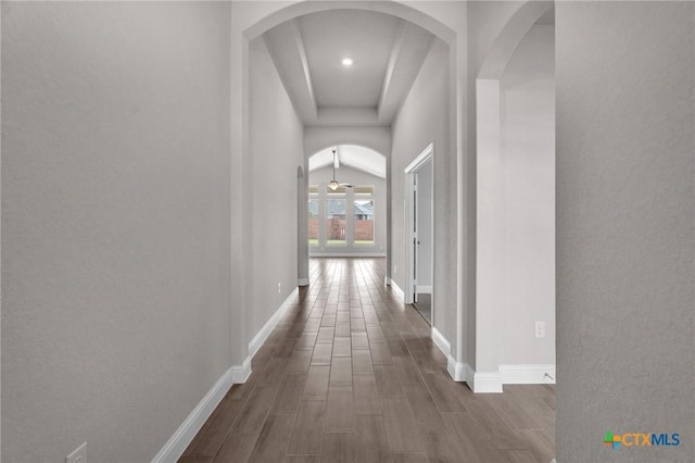 corridor featuring dark hardwood / wood-style floors