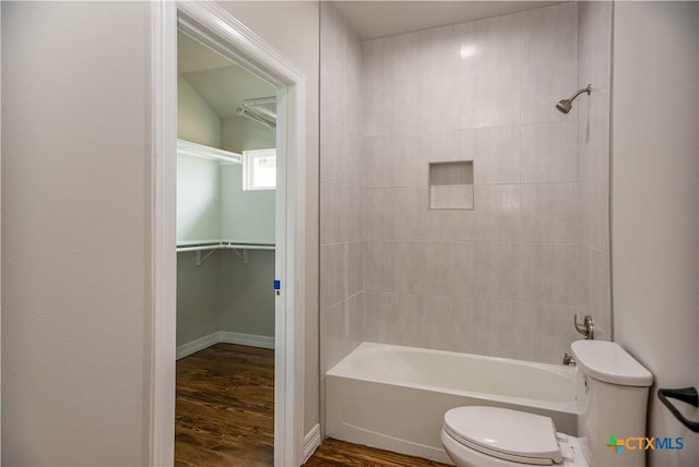 193 Powderhorn Ln, Port Lavaca, TX 77979 - bathroom with wood finished floors,  shower combination, and a walk in closet