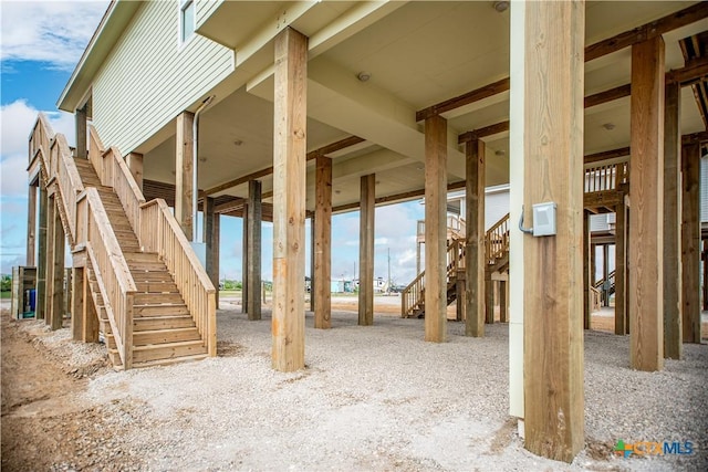 193 Powderhorn Ln, Port Lavaca, TX 77979 - misc room featuring stairway
