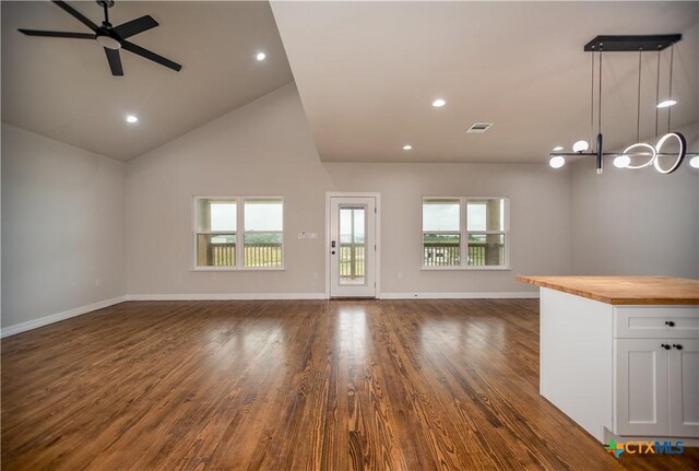 193 Powderhorn Ln, Port Lavaca, TX 77979 - unfurnished living room featuring ceiling fan, dark wood-style floors, high vaulted ceiling, and recessed lighting