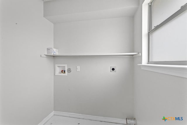 8606 Georgia Ave, Temple, TX 76502 - clothes washing area featuring washer hookup, baseboards, laundry area, and electric dryer hookup