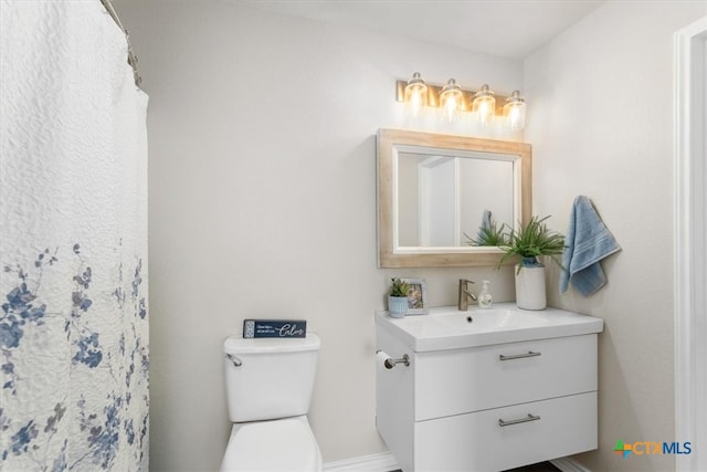 8606 Georgia Ave, Temple, TX 76502 - bathroom featuring vanity and toilet